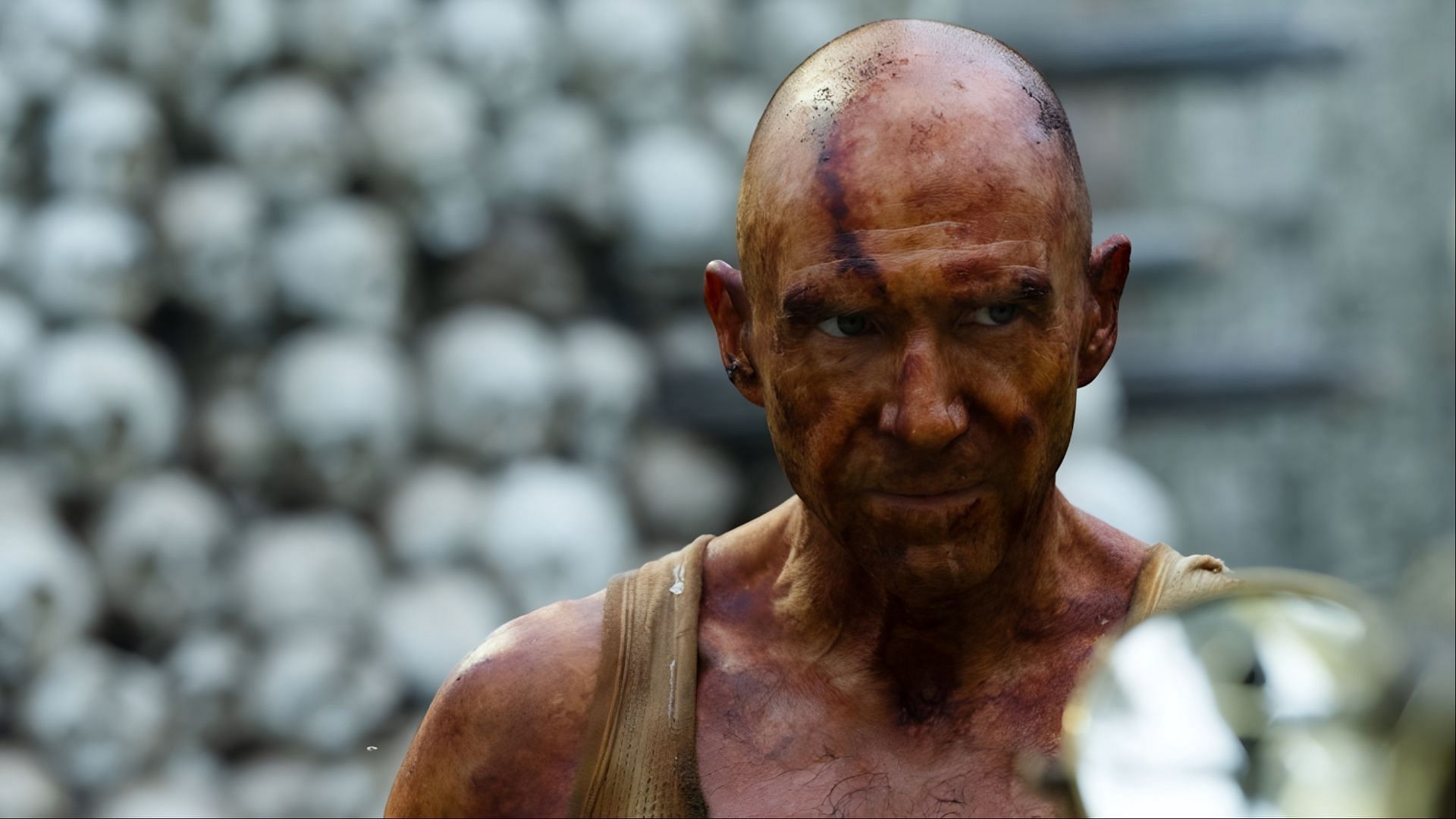 Ralph Fiennes as Dr. Ian Kelson in 28 Years Later, a survivor who builds the Bone Temple amidst the chaos of the infected world. (Image via Sony Pictures Entertainment)